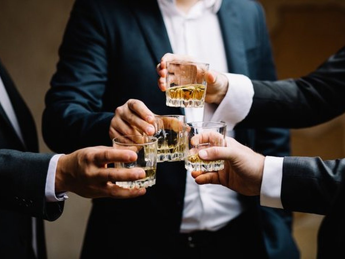 Whiskey Runners — cheers with glasses of whiskey